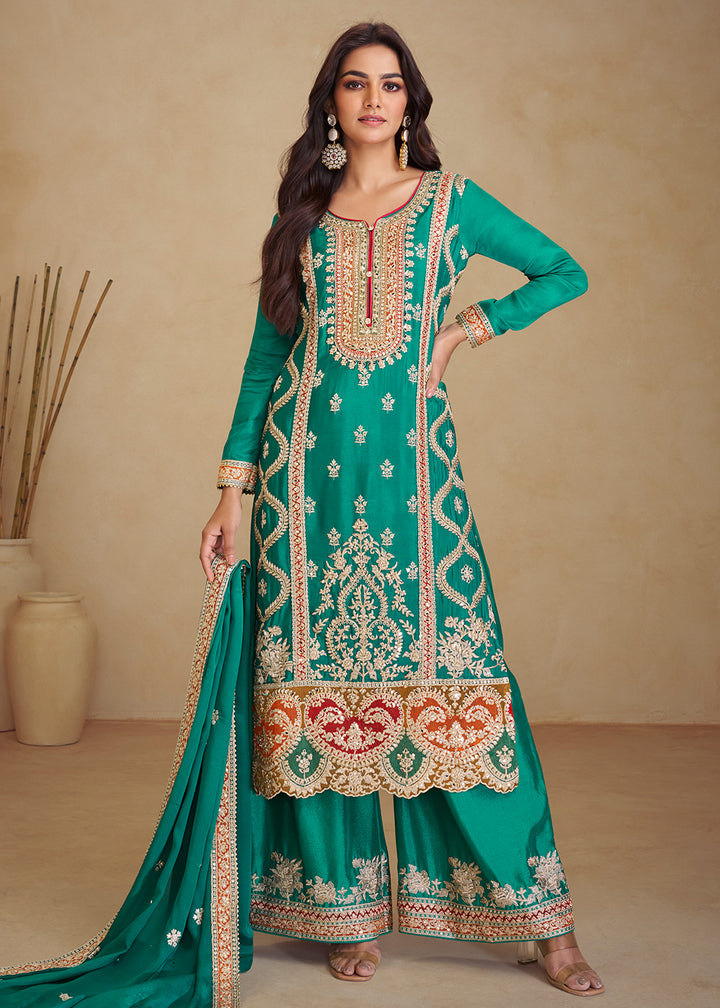 Buy Now Gorgeous Teal Chinnon Mehndi Wear Palazzo Suit Online in USA, UK, Canada, Germany, Italy, France & Worldwide at Empress Clothing. 