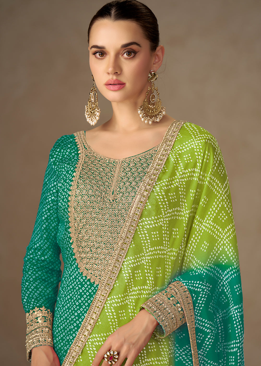 Buy Now Chinon Bandhej Printed Green Festive Anarkali Gown Online in US, UK, Germany, France, Italy, Canada, Australia, Sweden, Greece & Worldwide at Empress.