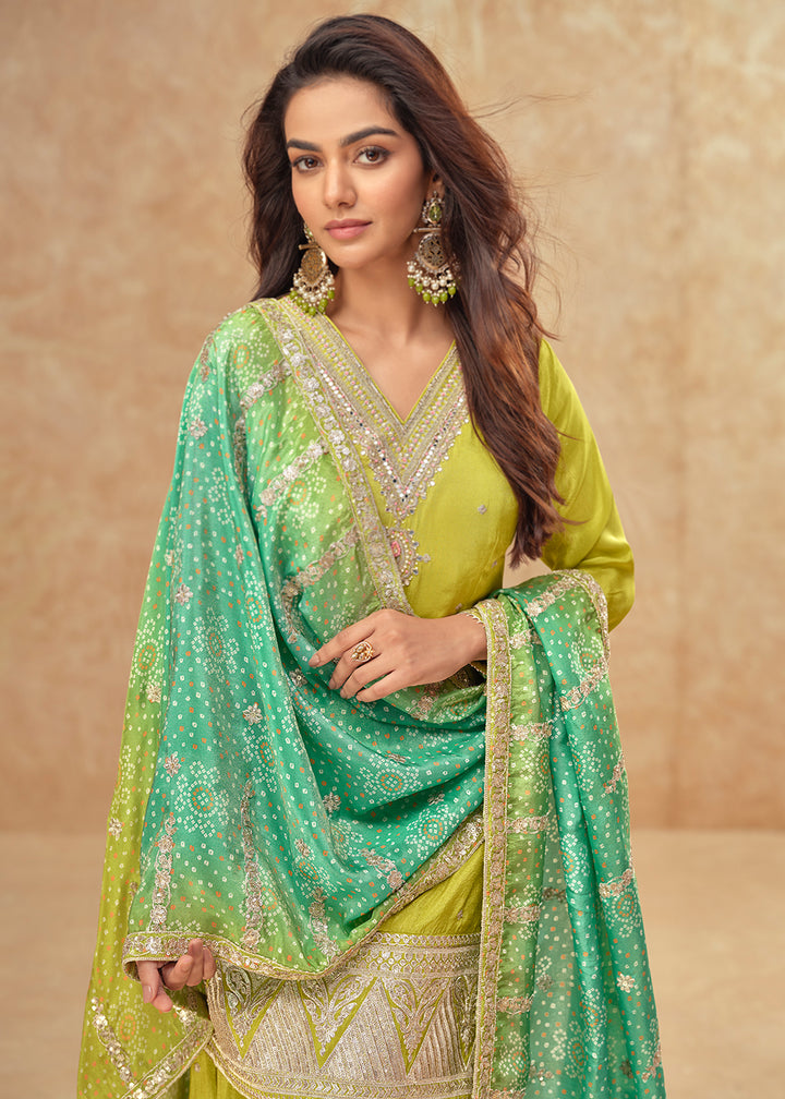 Buy Now Shimmer Silk Green Embroidered Festive Palazzo Style Suit Online in USA, UK, Canada, Germany, Italy, France, UAE & Worldwide at Empress Clothing.
