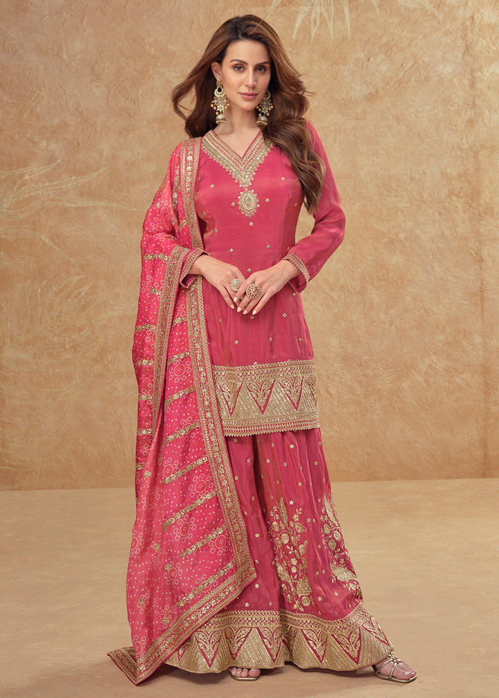 Buy Now Shimmer Silk Pink Embroidered Festive Palazzo Style Suit Online in USA, UK, Canada, Germany, Italy, France, UAE & Worldwide at Empress Clothing.