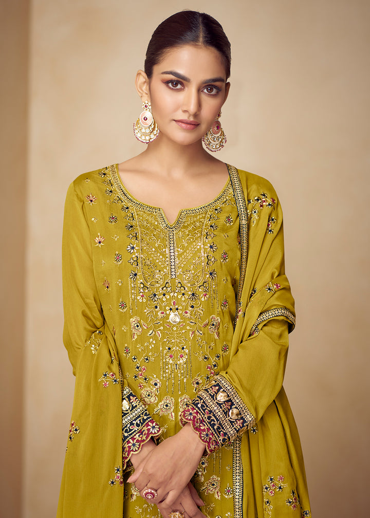 Buy Now Chinnon Yellow Hand Embroidered Festive Palazzo Suit Online in US, UK, Canada, Germany, Italy, France, Austria, Netherlands, UAE & Worldwide at Empress.