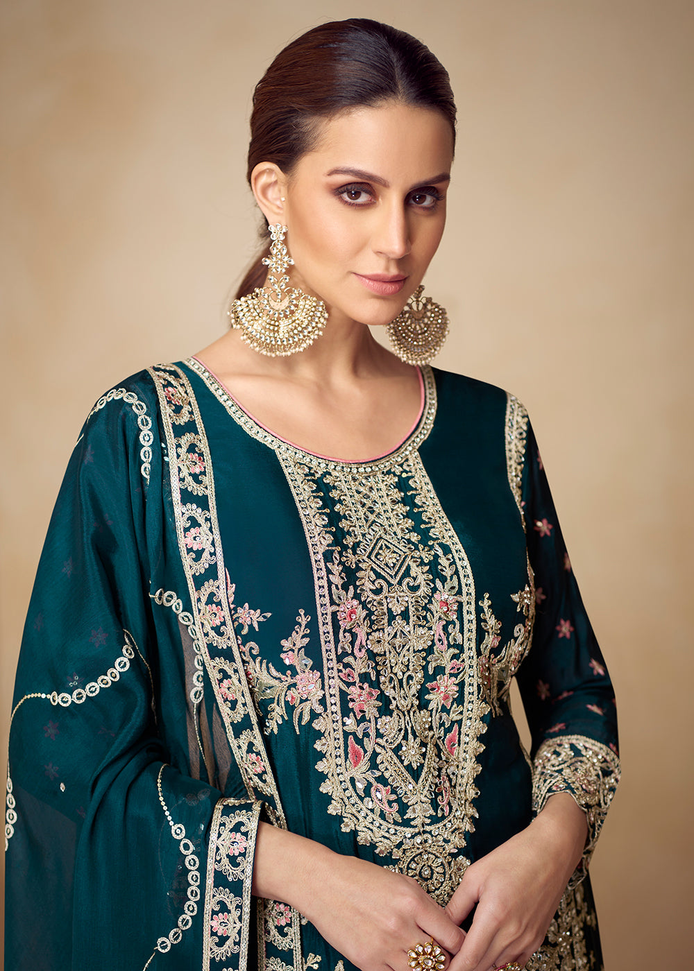 Buy Now Chinnon Teal Hand Embroidered Festive Palazzo Suit Online in US, UK, Canada, Germany, Italy, France, Austria, Netherlands, UAE & Worldwide at Empress.