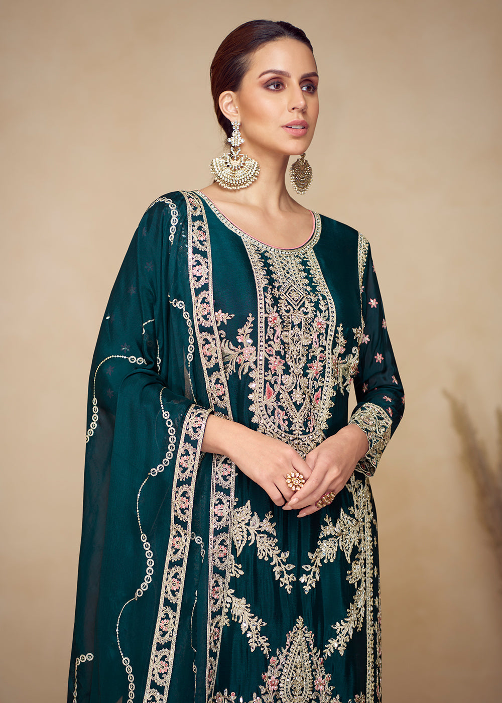 Buy Now Chinnon Teal Hand Embroidered Festive Palazzo Suit Online in US, UK, Canada, Germany, Italy, France, Austria, Netherlands, UAE & Worldwide at Empress.