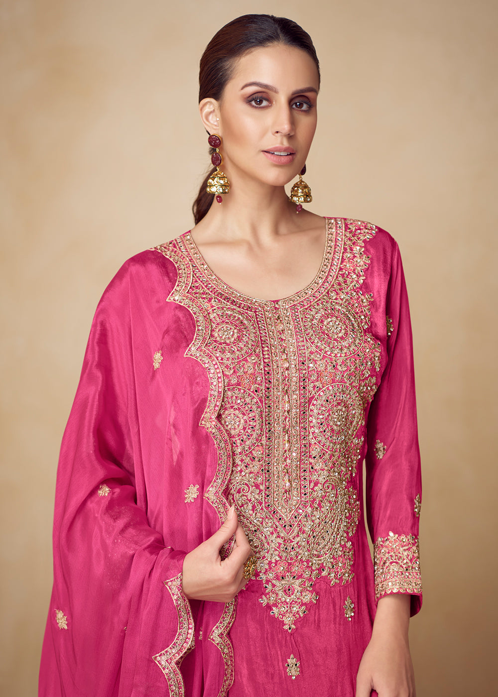 Buy Now Chinnon Pink Hand Embroidered Festive Palazzo Suit Online in US, UK, Canada, Germany, Italy, France, Austria, Netherlands, UAE & Worldwide at Empress.