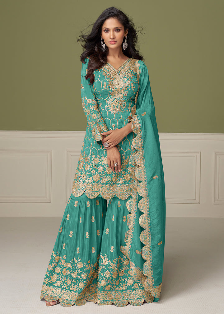 Buy Now Pretty Embroidered Turquoise Shimmer Silk Gharara Suit Online in USA, UK, Canada, Germany, Italy, France, Austria, Denmark, UAE & Worldwide at Empress.