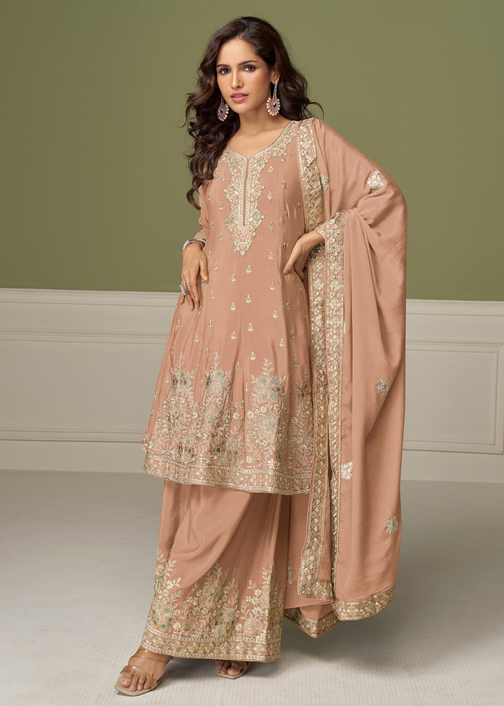 Buy Now Peach Beautiful Embroidered Festive Palazz Suit Online in US, UK, Canada, Germany, Italy, France, Austria, Denmark, Australia & Worldwide at Empress.
