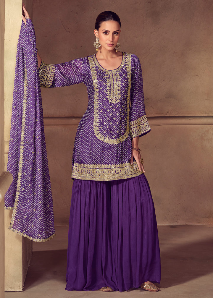 Shop Now Premium Purple Embroidered Festive Gharara Style Suit Online in USA, UK, Canada, France, Qatar, Germany, Italy, Spain & Worldwide at Empress Clothing.