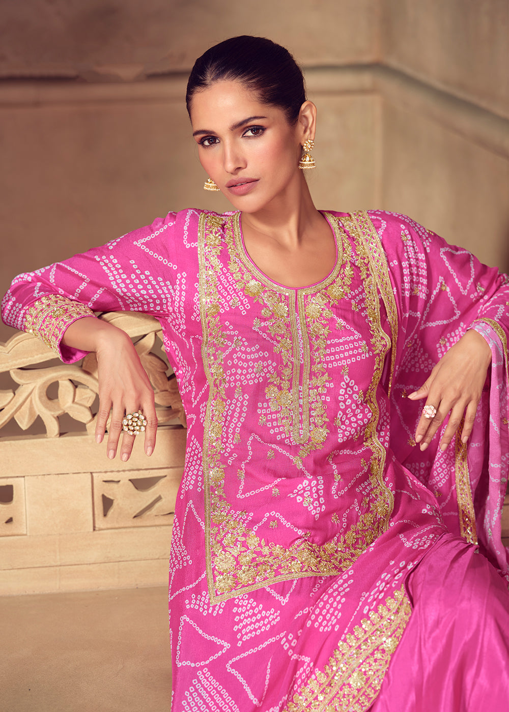 Shop Now Premium Pink Embroidered Festive Gharara Style Suit Online in USA, UK, Canada, France, Qatar, Germany, Italy, Spain & Worldwide at Empress Clothing.