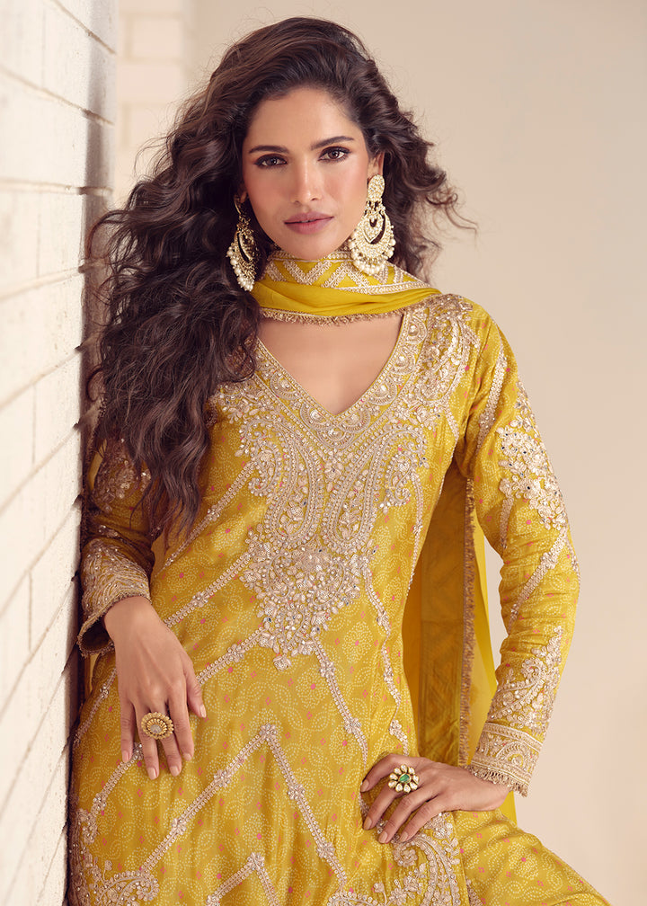 Buy Now Festive Style Printed Yellow Embroidered Palazzo Suit Suit Online in US, UK, Canada, Germany, Italy, France, Austria, Denmark & Worldwide at Empress.