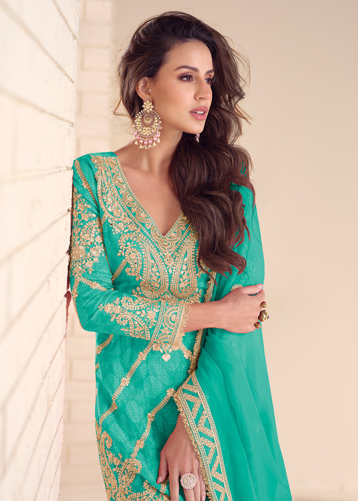 Buy Now Festive Style Printed Turquoise Embroidered Palazzo Suit Suit Online in US, UK, Canada, Germany, Italy, France, Austria, Denmark & Worldwide at Empress.