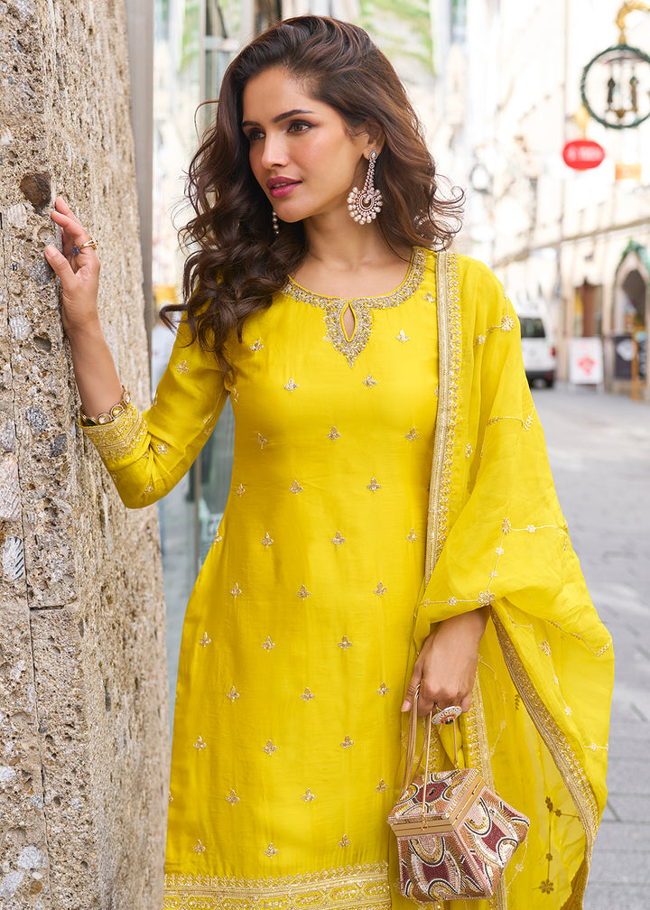 Buy Now Stunning Yellow Embroidered Festive Style Gharara Suit Online in USA, UK, Canada, Germany, Italy, France, Austria, Denmark, UAE & Worldwide at Empress.