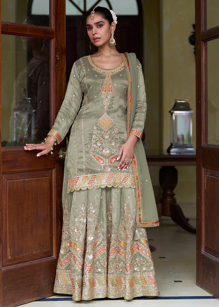 Buy Now Green Real Shimmer Silk Festive Skirt Style Suit Online in Newark, Miami, Toronto, London, Bayern, Austin, Denver, New York & Worldwide at Empress.