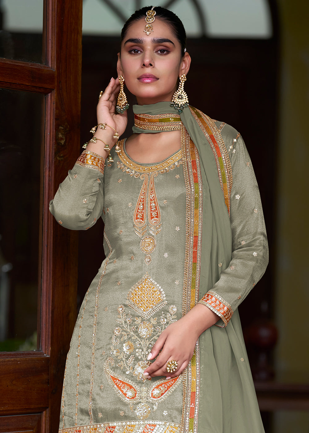 Buy Now Green Real Shimmer Silk Festive Skirt Style Suit Online in Newark, Miami, Toronto, London, Bayern, Austin, Denver, New York & Worldwide at Empress.