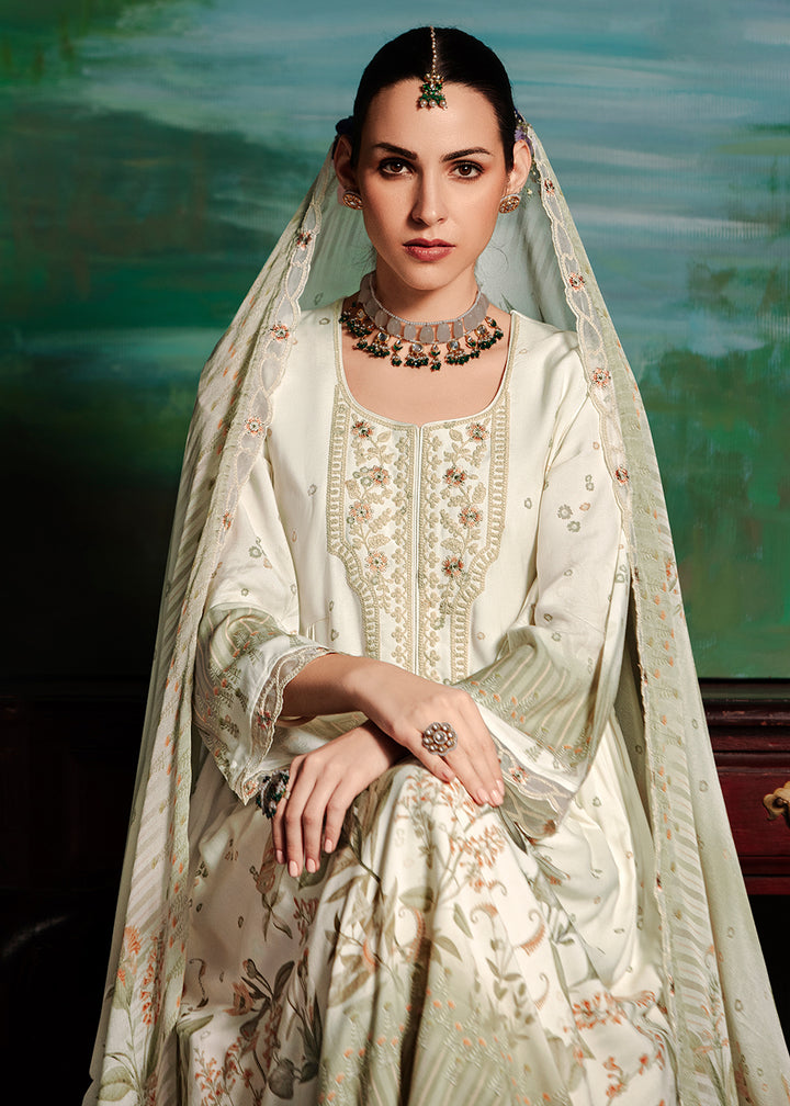 Buy Now Off White Embroidered Muslin Festive Style Salwar Suit Online in USA, UK, Canada, Germany, Italy, France, Austria & Worldwide at Empress Clothing.