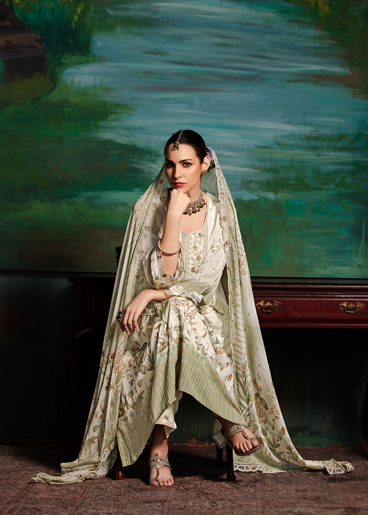 Buy Now Off White Embroidered Muslin Festive Style Salwar Suit Online in USA, UK, Canada, Germany, Italy, France, Austria & Worldwide at Empress Clothing.