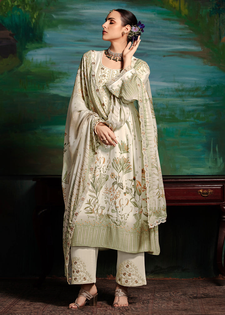 Buy Now Off White Embroidered Muslin Festive Style Salwar Suit Online in USA, UK, Canada, Germany, Italy, France, Austria & Worldwide at Empress Clothing.