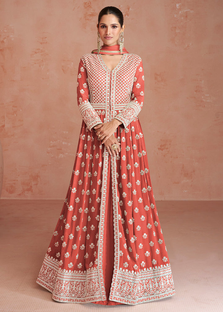 Buy Now Coral Peach Slit Style Embroidered Georgette Skirt Anarkali Suit Online in USA, UK, Australia, New Zealand, Canada, Italy & Worldwide at Empress Clothing. 