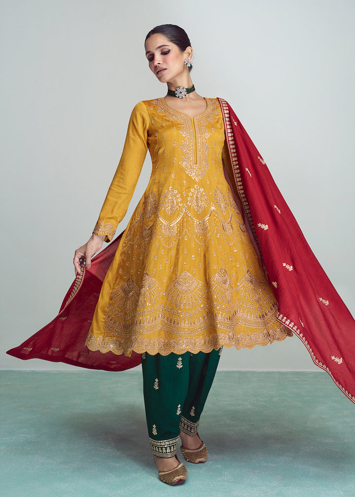 Buy Now Yellow & Green Silk Embroidered Peplum Punjabi Style Suit Online in USA, UK, Canada, Germany, Australia & Worldwide at Empress Clothing. 