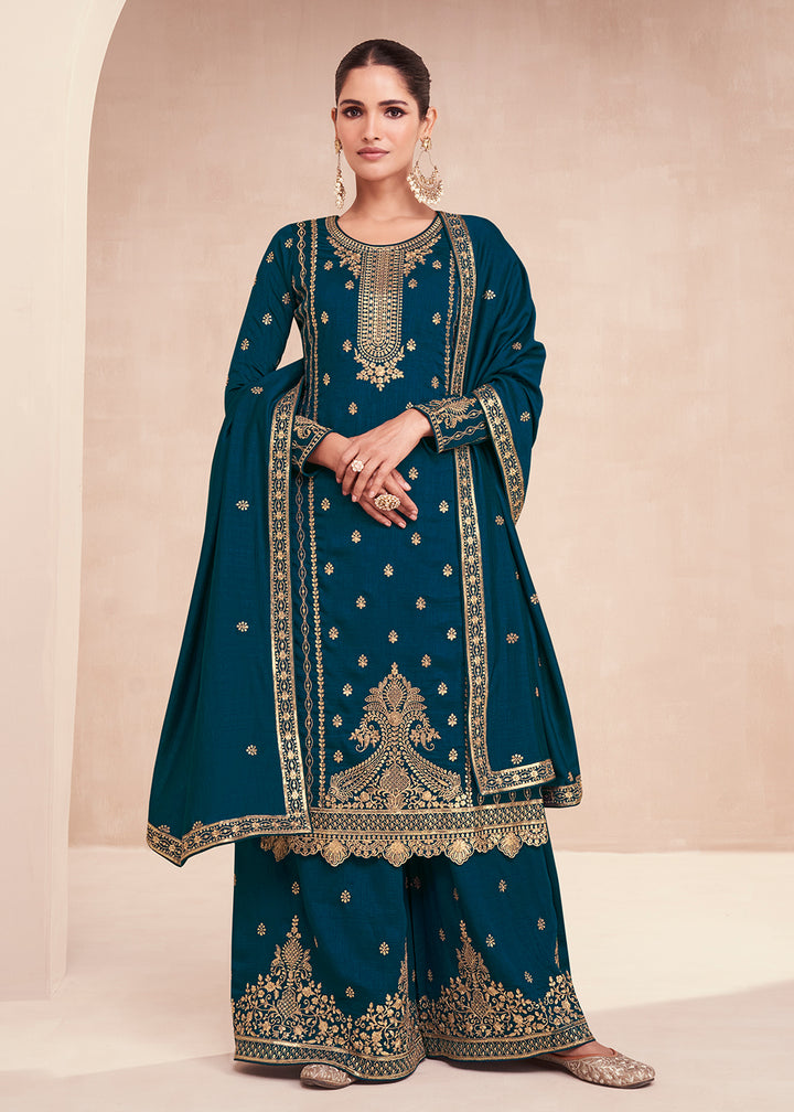 Buy Now Captivating Teal Blue Zari Embroidered Palazzo Salwar Suit Online in USA, UK, Canada, Germany, Australia & Worldwide at Empress Clothing. 