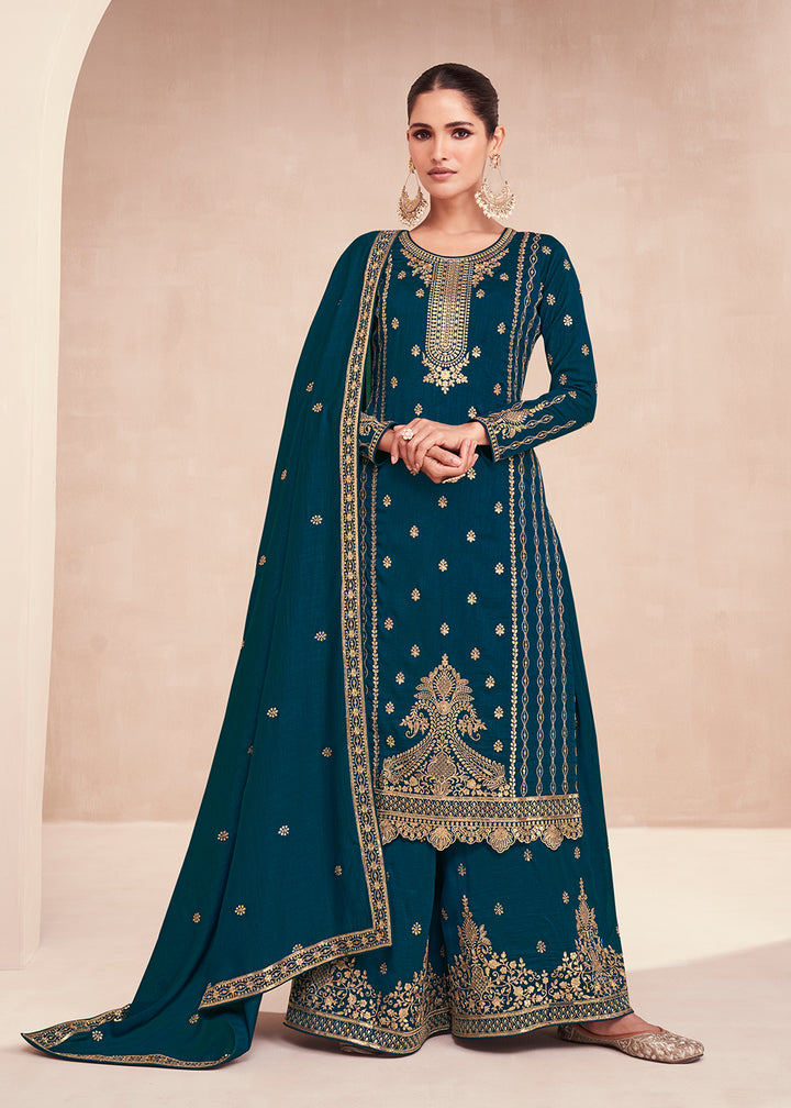 Buy Now Captivating Teal Blue Zari Embroidered Palazzo Salwar Suit Online in USA, UK, Canada, Germany, Australia & Worldwide at Empress Clothing. 