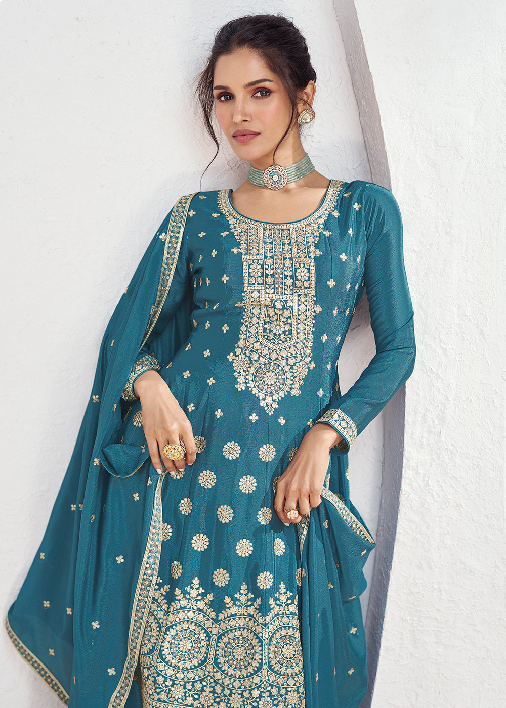 Buy Now Incredible Teal Blue Embroidered Chinnon Festive Palazzo Suit Online in USA, UK, Canada, Germany, Australia & Worldwide at Empress Clothing.