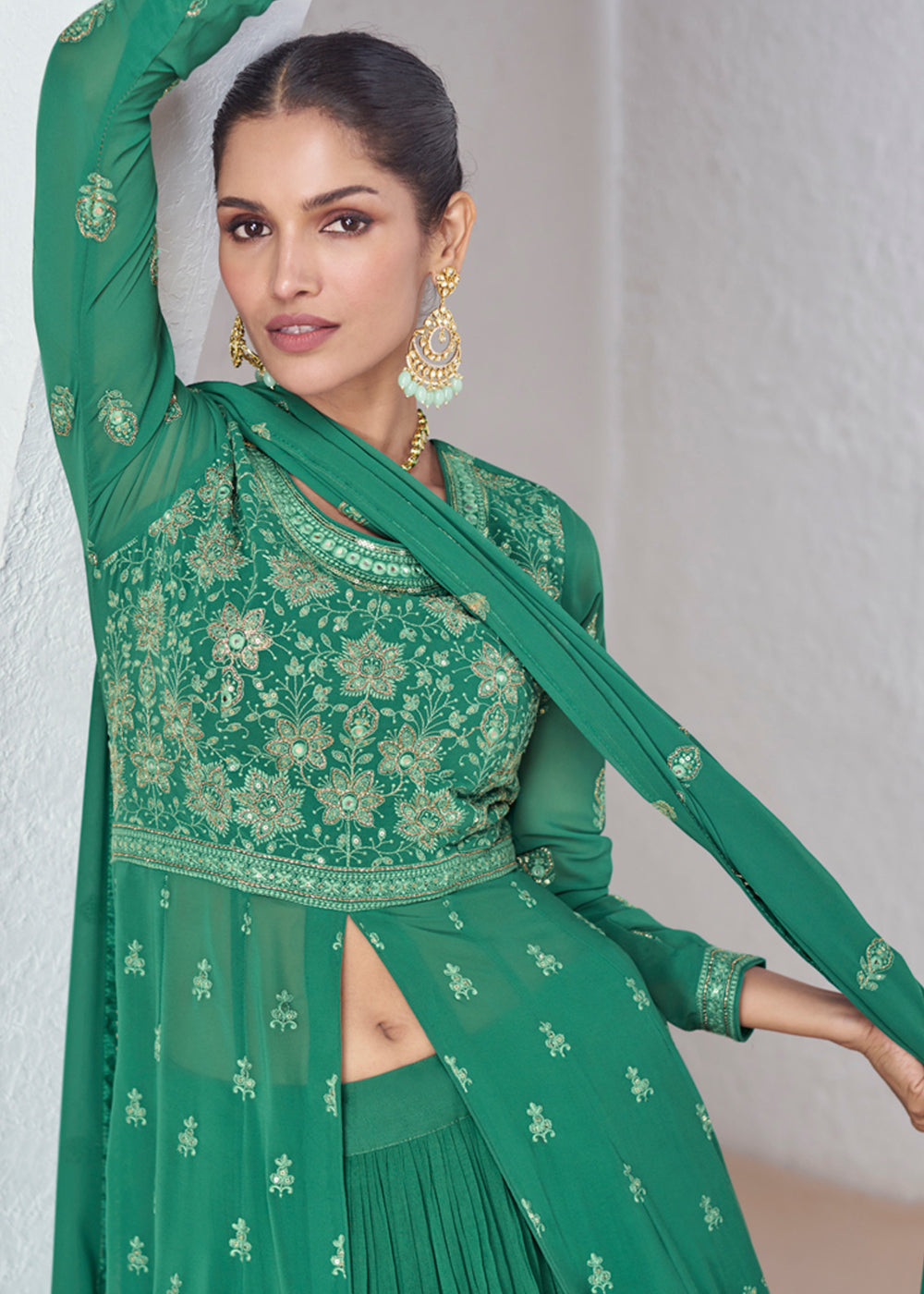 Buy Now Green Front Slit Embroidered Lehenga Skirt Suit Online in USA, UK, Canada, Germany, Australia & Worldwide at Empress Clothing. 