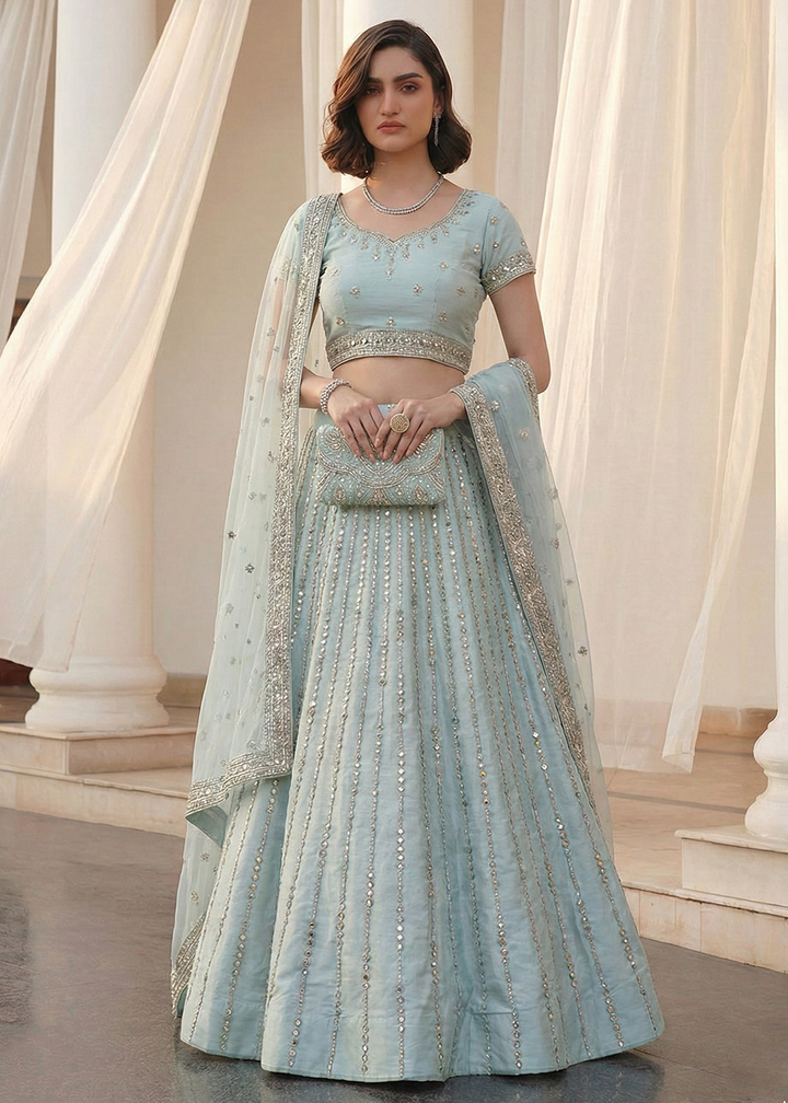 Buy Now Mirror Work Pastel Blue Wedding Wear Lehenga Online in US, UK, Canada, France, Germany, Sweden, Greece, Denmark, Spain, Africa & Worldwide at Empress.