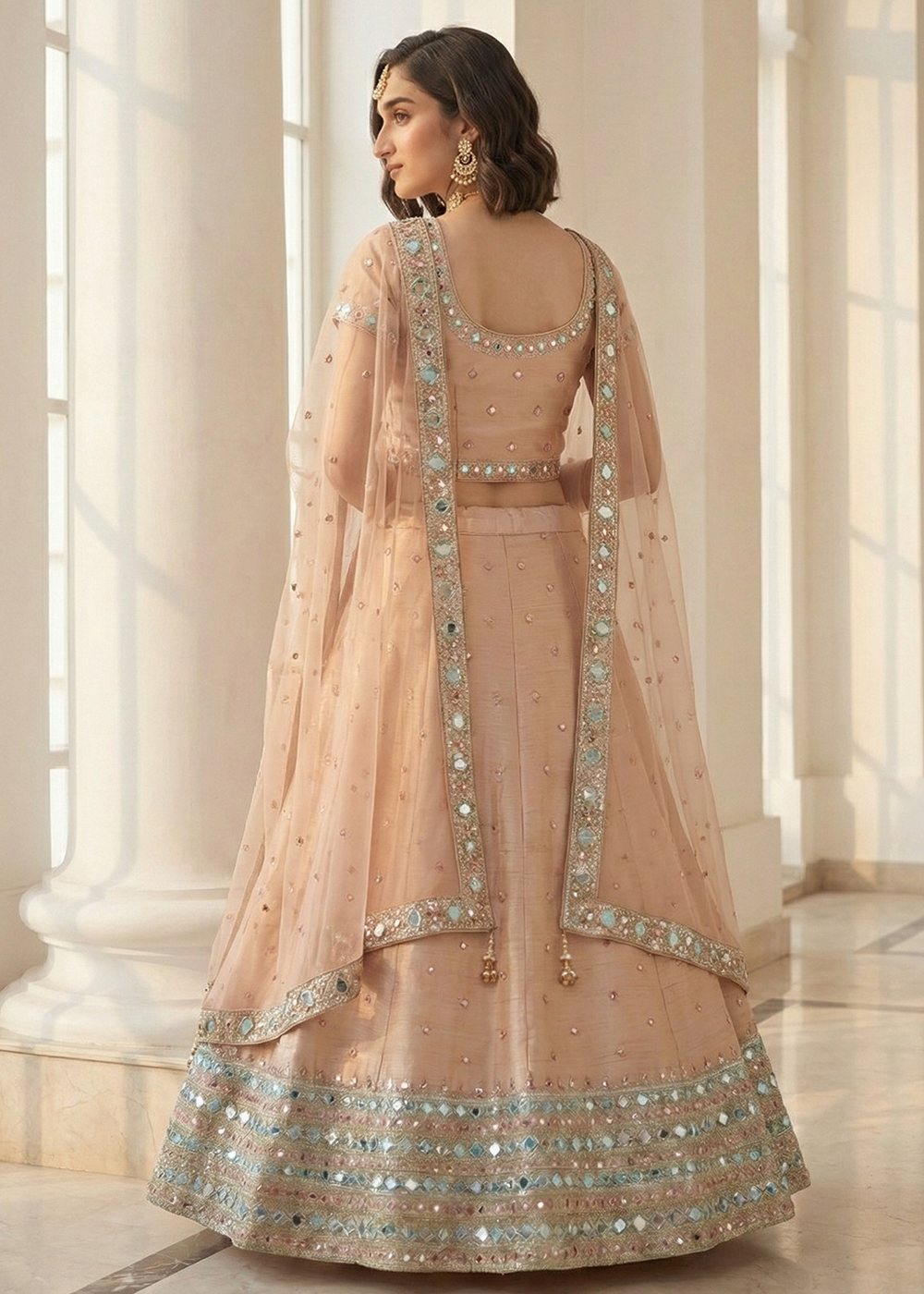 Buy Now Mirror Work Pastel Peach Wedding Wear Lehenga Online in US, UK, Canada, France, Germany, Sweden, Greece, Denmark, Spain, Africa & Worldwide at Empress.