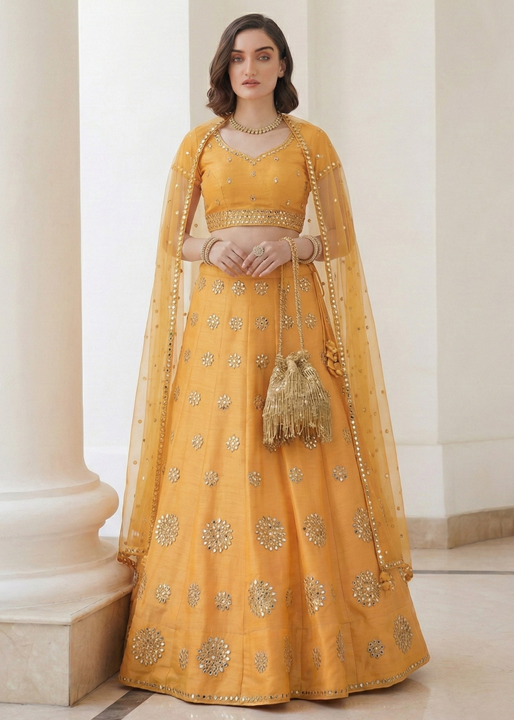 Buy Now Mirror Work Pastel Yellow Wedding Wear Lehenga Online in US, UK, Canada, France, Germany, Sweden, Greece, Denmark, Spain, Africa & Worldwide at Empress.