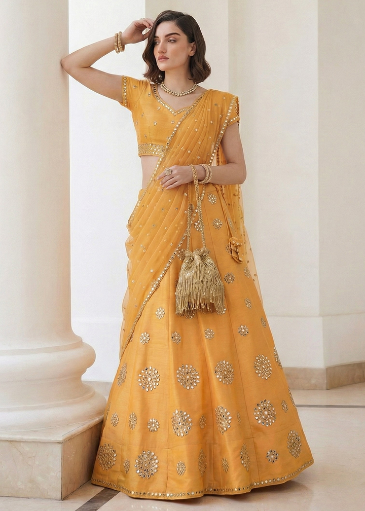 Buy Now Mirror Work Pastel Yellow Wedding Wear Lehenga Online in US, UK, Canada, France, Germany, Sweden, Greece, Denmark, Spain, Africa & Worldwide at Empress.