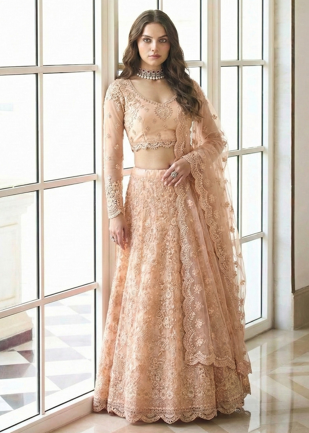 Buy Now Adorable Peach Heavy Net Embroidered Bridal Lehenga Choli Online in USA, UK, France, Italy, Germany, Sweden, Greece, Qatar, UAE & Worldwide at Empress.