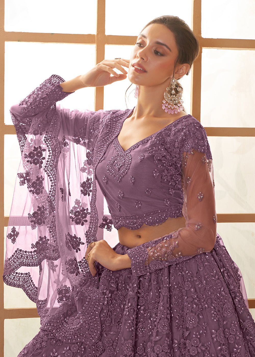 Buy Now Adorable Purple Heavy Net Embroidered Bridal Lehenga Choli Online in USA, UK, France, UAE & Worldwide at Empress Clothing. 