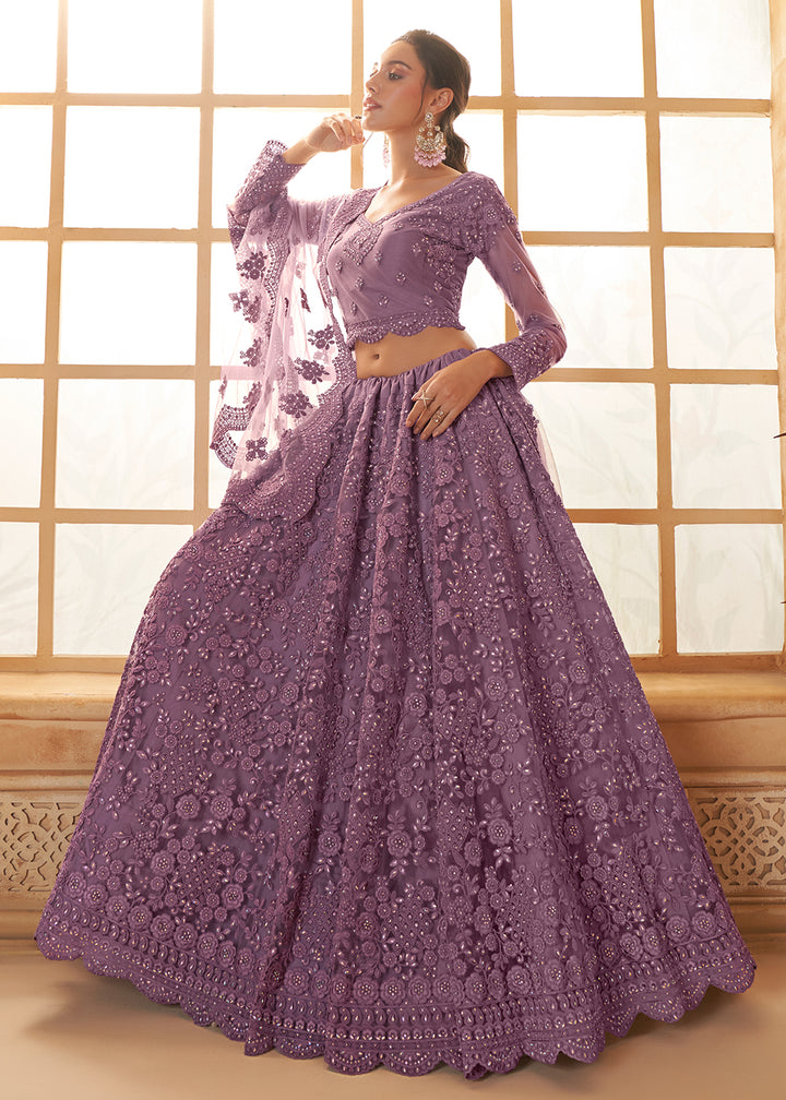 Buy Now Adorable Purple Heavy Net Embroidered Bridal Lehenga Choli Online in USA, UK, France, UAE & Worldwide at Empress Clothing. 