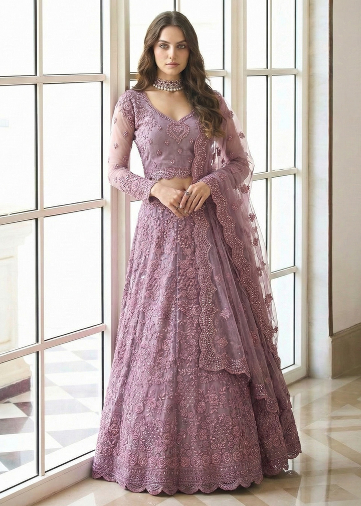 Buy Now Adorable Purple Heavy Net Embroidered Bridal Lehenga Choli Online in USA, UK, France, Greece, Netherlands, Germany, Swiss, UAE & Worldwide at Empress.