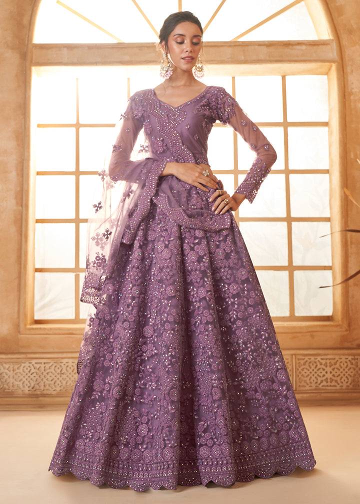 Buy Now Adorable Purple Heavy Net Embroidered Bridal Lehenga Choli Online in USA, UK, France, UAE & Worldwide at Empress Clothing. 