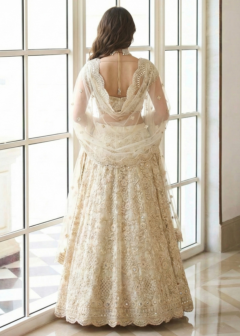 Buy Now Adorable Cream Heavy Net Embroidered Bridal Lehenga Choli Online in USA, UK, France, Swiss, Netherlands, Germany, Italy, Qatar & Worldwide at Empress.