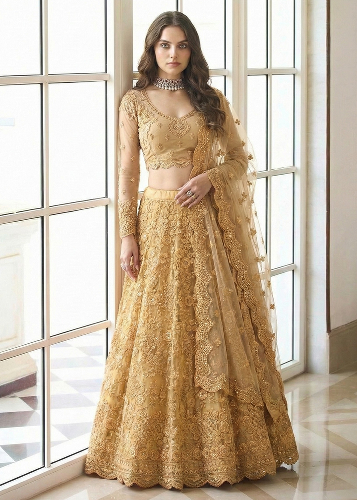 Buy Now Adorable Golden Heavy Net Embroidered Bridal Lehenga Choli Online in USA, UK, France, Swiss, Netherlands, Germany, Italy, Qatar & Worldwide at Empress.