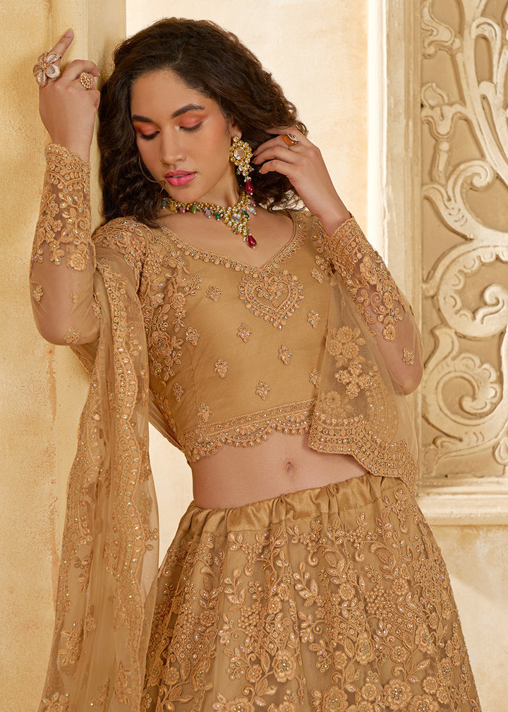 Buy Now Adorable Golden Heavy Net Embroidered Bridal Lehenga Choli Online in USA, UK, France, UAE & Worldwide at Empress Clothing. 