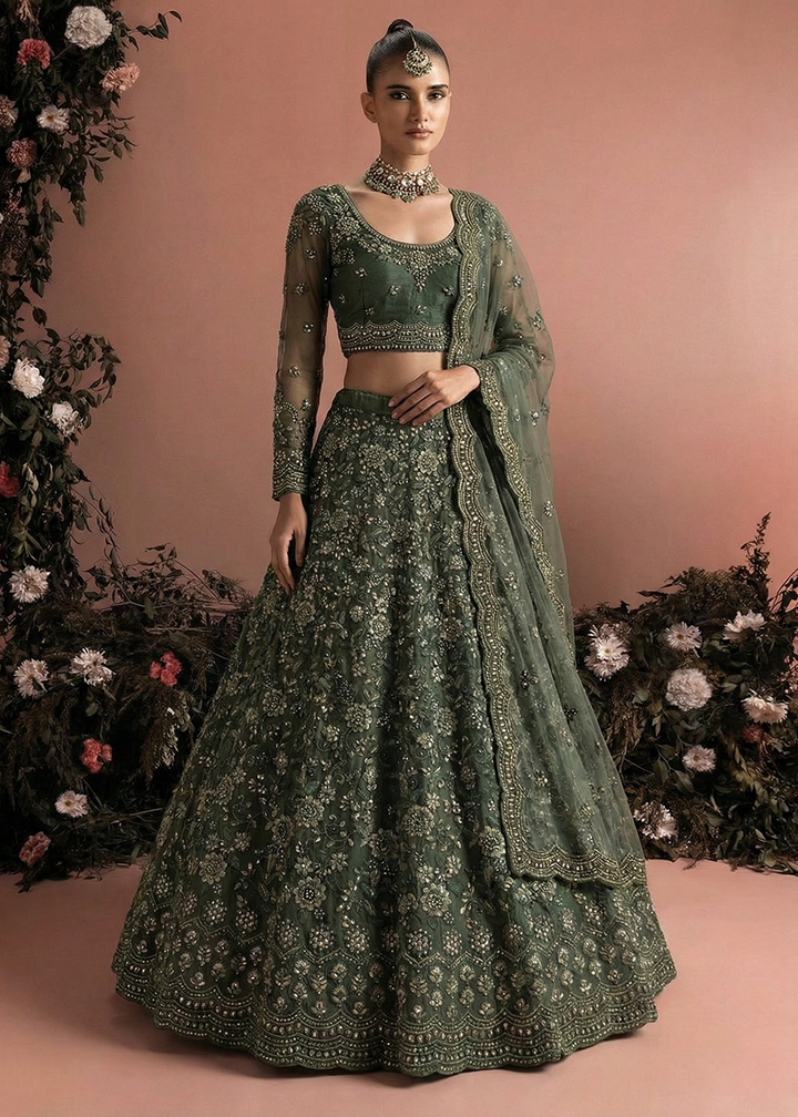 Buy Now Awesome Green Heavy Net Embroidered Bridal Lehenga Choli Online in USA, UK, France, Canada, Italy, Sweden, Greece, UAE & Worldwide at Empress Clothing.