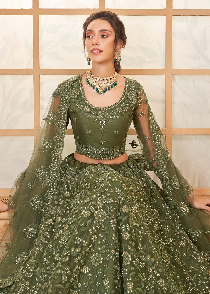 Buy Now Attractive Green Heavy Net Embroidered Bridal Lehenga Choli Online in USA, UK, France, UAE & Worldwide at Empress Clothing.