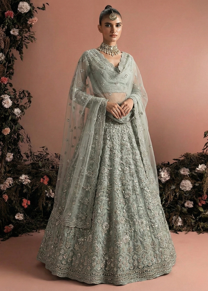 Buy Now Awesome Grey Heavy Net Embroidered Bridal Lehenga Choli Online in USA, UK, France, Canada, Italy, Sweden, Greece, UAE & Worldwide at Empress Clothing.