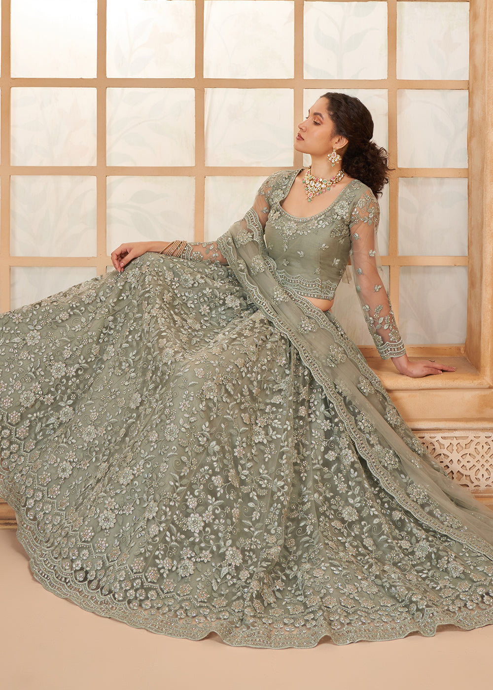 Buy Now Attractive Grey Heavy Net Embroidered Bridal Lehenga Choli Online in USA, UK, France, UAE & Worldwide at Empress Clothing. 