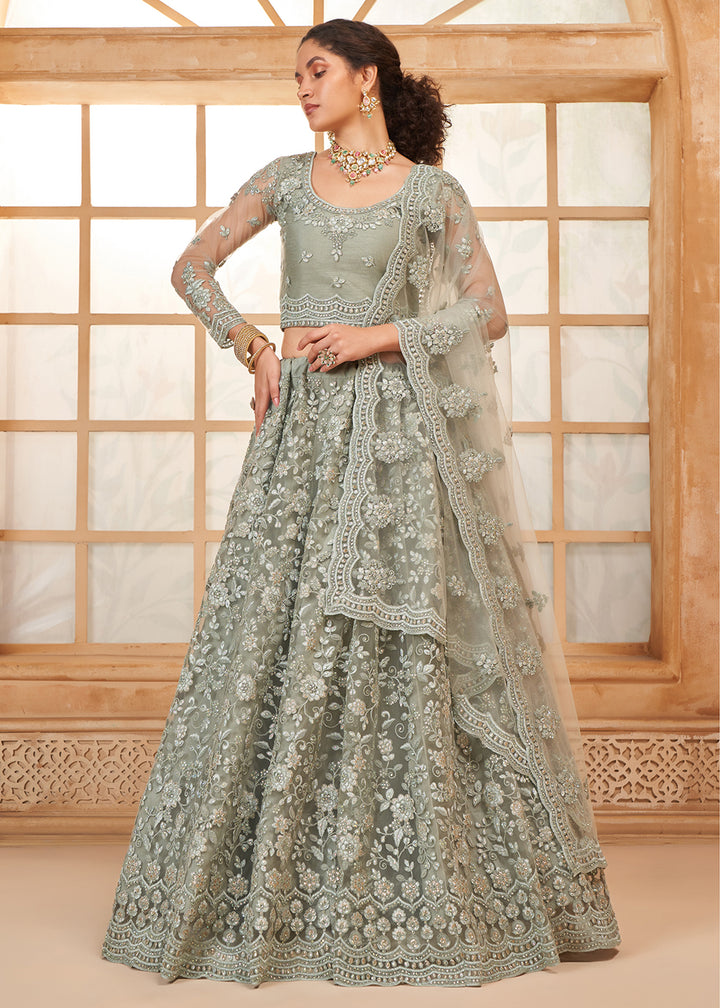 Buy Now Attractive Grey Heavy Net Embroidered Bridal Lehenga Choli Online in USA, UK, France, UAE & Worldwide at Empress Clothing. 