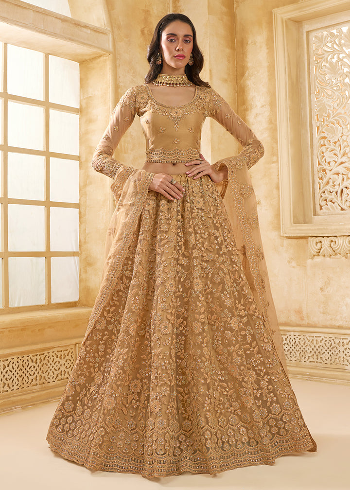 Buy Now Attractive Golden Heavy Net Embroidered Bridal Lehenga Choli Online in USA, UK, France, UAE & Worldwide at Empress Clothing. 