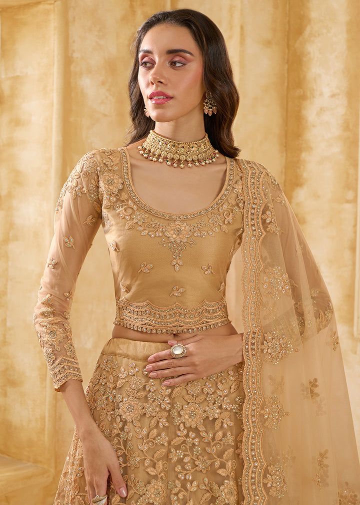 Buy Now Attractive Golden Heavy Net Embroidered Bridal Lehenga Choli Online in USA, UK, France, UAE & Worldwide at Empress Clothing. 