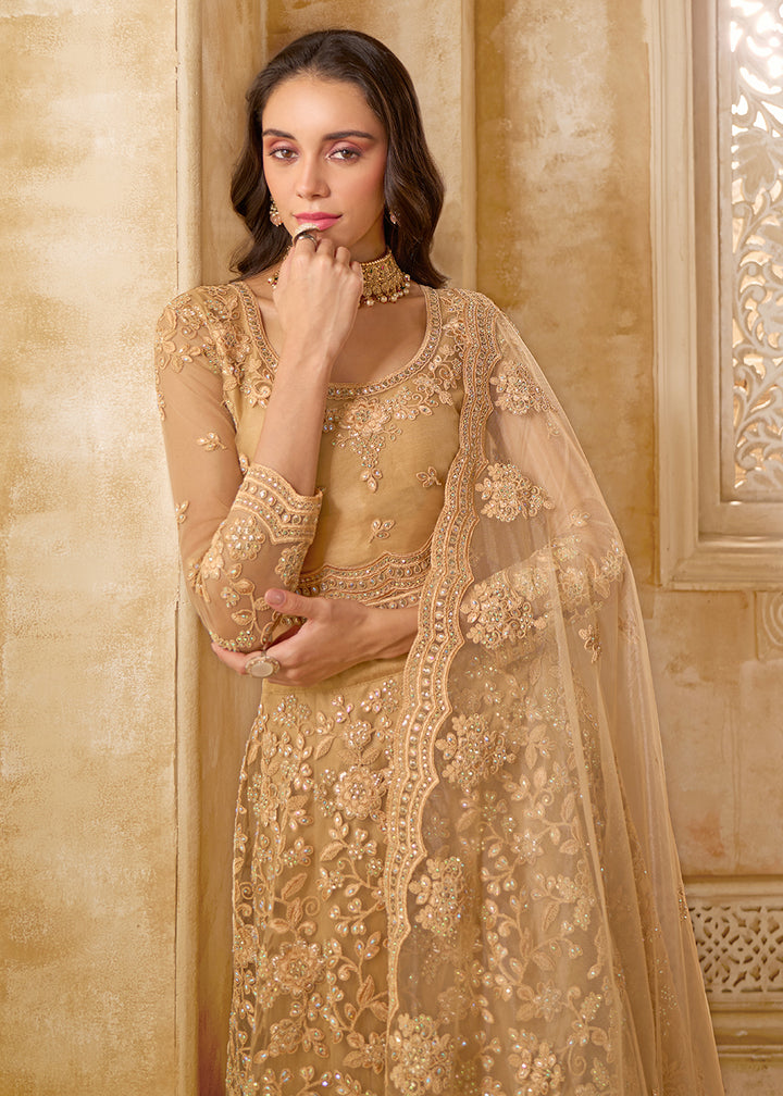 Buy Now Attractive Golden Heavy Net Embroidered Bridal Lehenga Choli Online in USA, UK, France, UAE & Worldwide at Empress Clothing. 