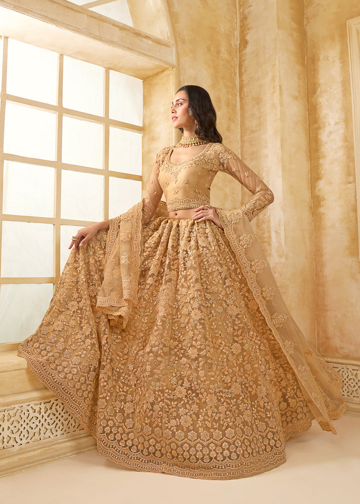 Buy Now Attractive Golden Heavy Net Embroidered Bridal Lehenga Choli Online in USA, UK, France, UAE & Worldwide at Empress Clothing. 