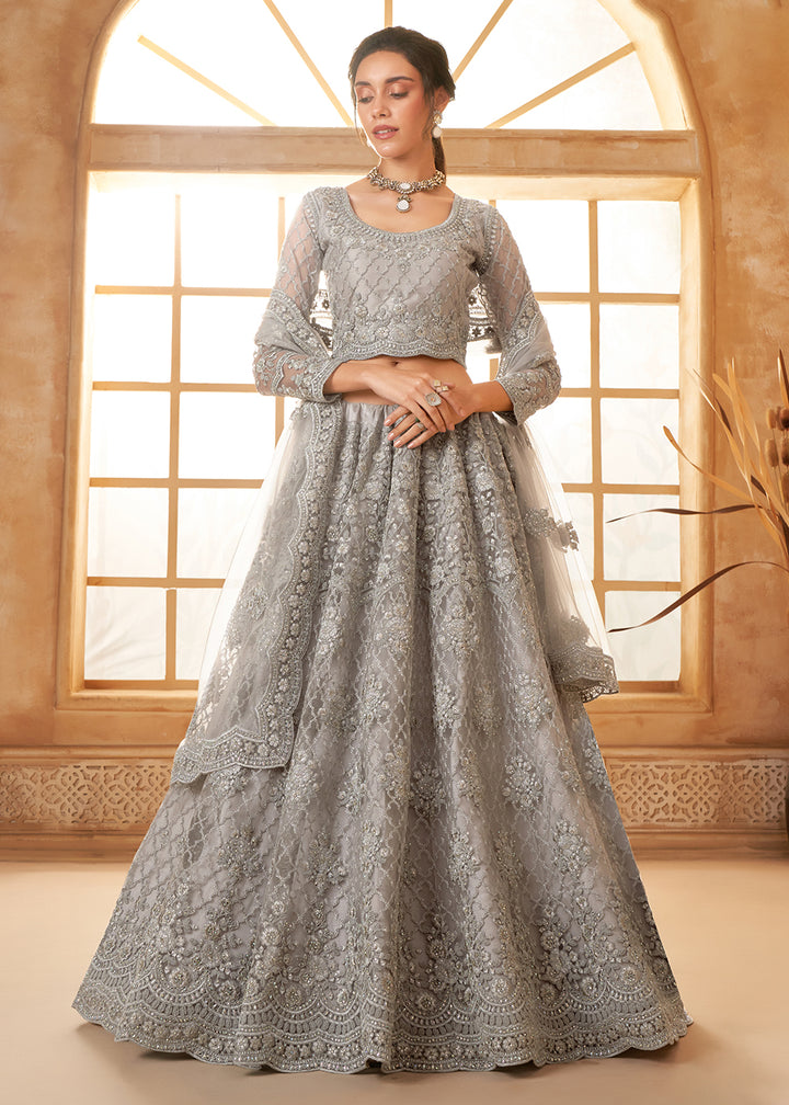 Buy Now Lovely Grey Heavy Net Embroidered Bridal Lehenga Choli Online in USA, UK, France, UAE & Worldwide at Empress Clothing.