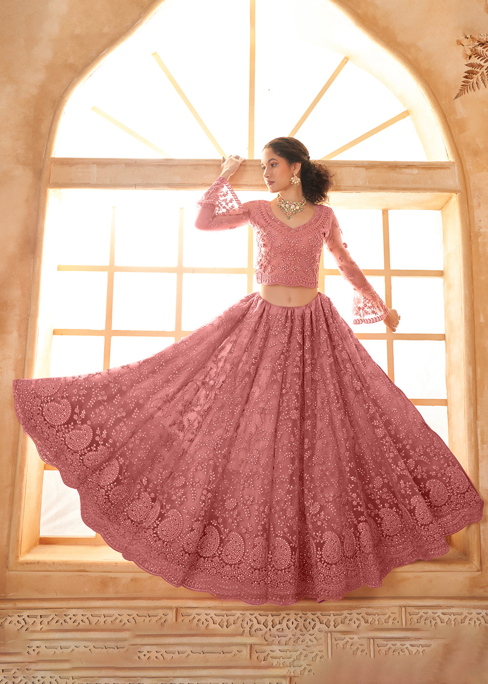 Buy Now Awesome Pink Heavy Net Embroidered Bridal Lehenga Choli Online in USA, UK, France, UAE & Worldwide at Empress Clothing. 