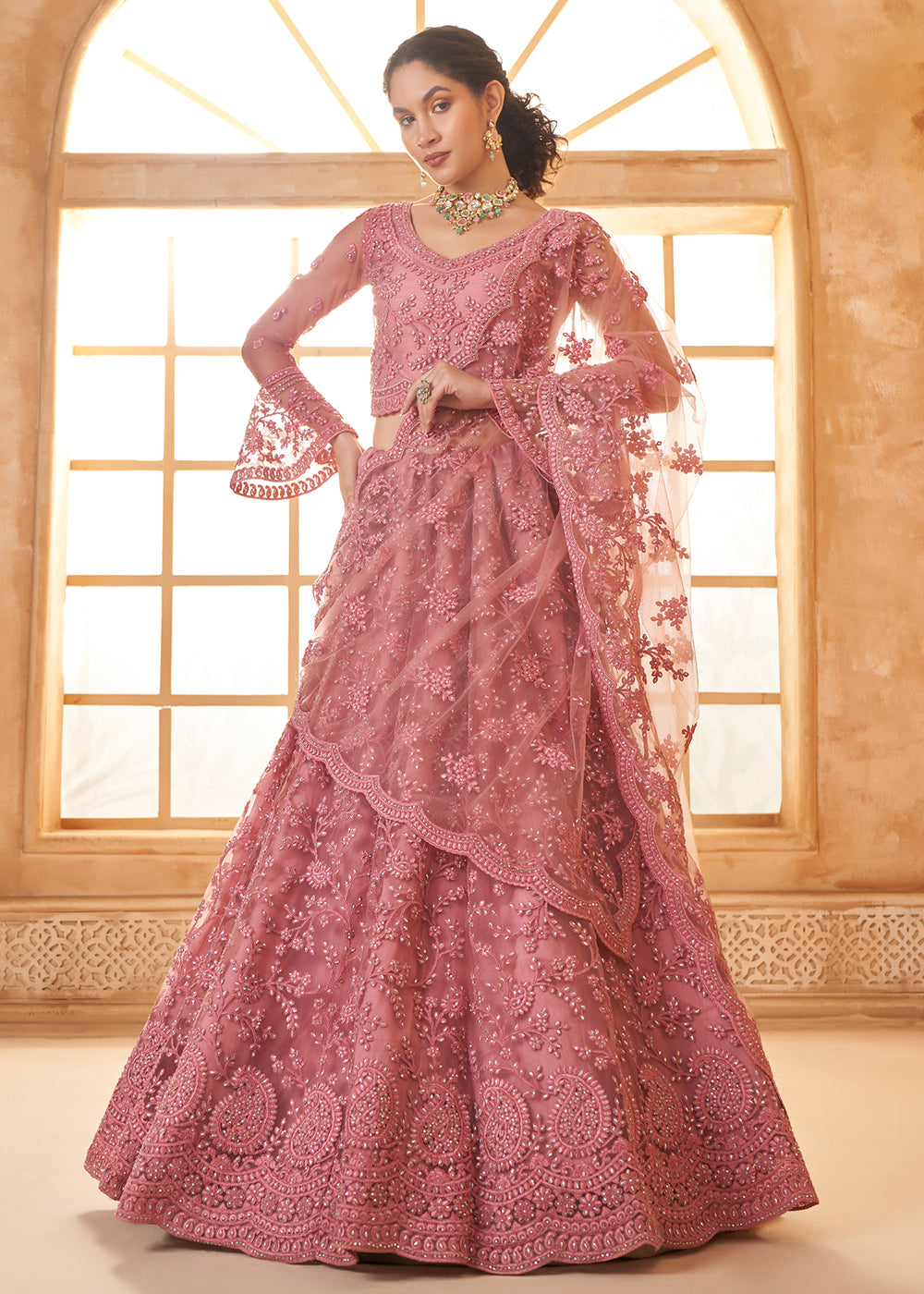 Buy Now Awesome Pink Heavy Net Embroidered Bridal Lehenga Choli Online in USA, UK, France, UAE & Worldwide at Empress Clothing. 